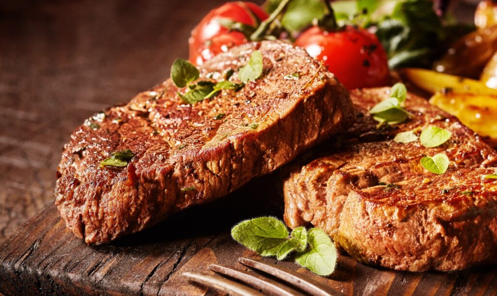 tender beef steak on cutting board